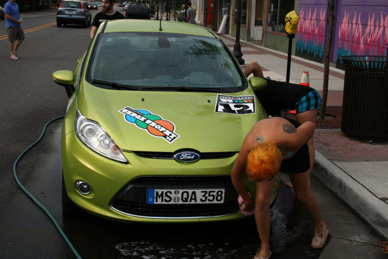 Illustration for article titled Noir Leather Bikini Car Wash Meetup Pictures